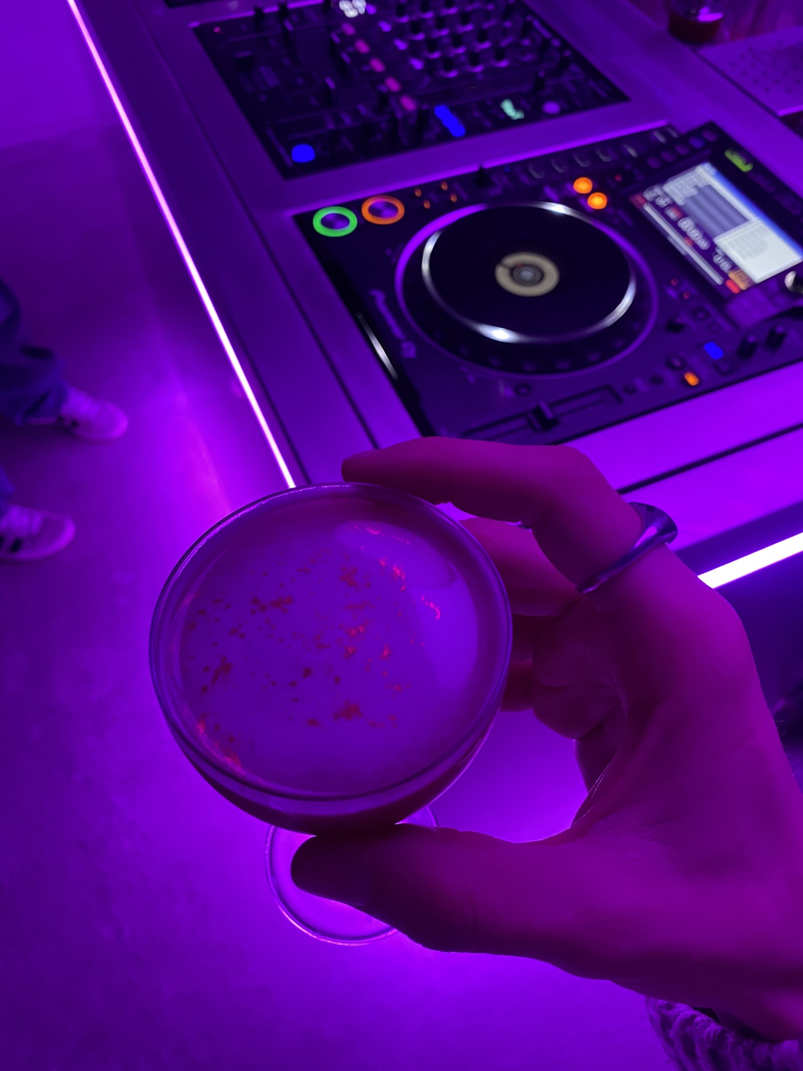 DJ crystal ball with atmospheric purple setup at KINKI Cocktail Club