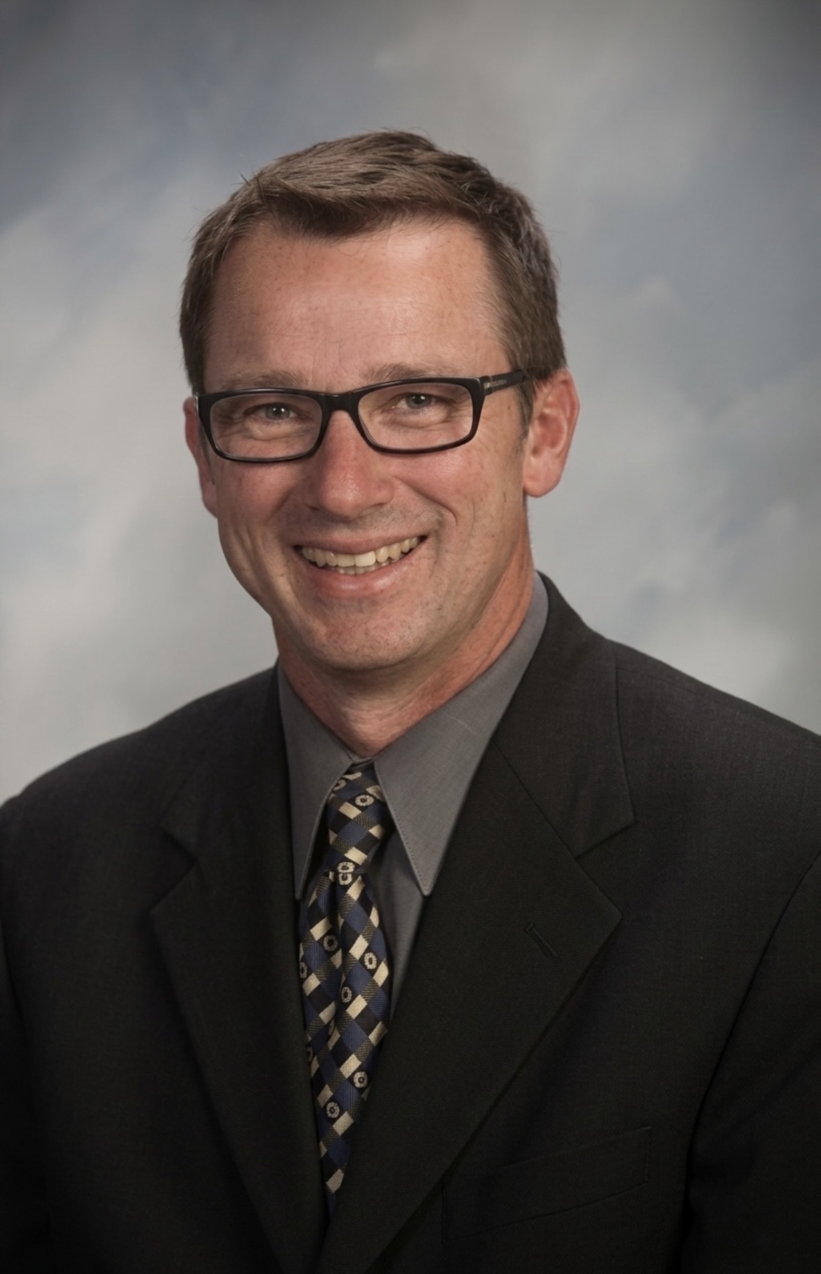 Dr. Richard Graves, podiatrist at Village Health Center, professional medical portrait